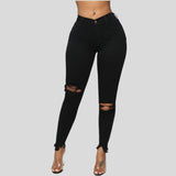 Women's elastic ripped solid color denim long trousers