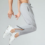 Ice silk quick-drying breathable fitness drawstring casual side zipper trousers