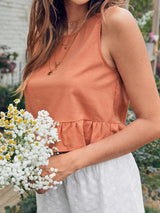 Women's sleeveless lotus leaf edge hem pure color round neck top