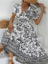 All-over positioning print printed puff-sleeved maxi-neck dressSizing: True to size Material composition: 95% polyester, 5% spandex Material: Polyester Pattern: Self design Season: Spring-Summer Sleeve_type: Regular sleeve Style: Grace Sleeve_length: Long