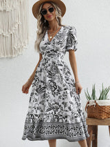 All-over positioning print printed puff-sleeved maxi-neck dressSizing: True to size Material composition: 95% polyester, 5% spandex Material: Polyester Pattern: Self design Season: Spring-Summer Sleeve_type: Regular sleeve Style: Grace Sleeve_length: Long