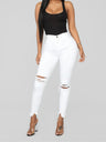 Women's elastic ripped solid color denim long trousers